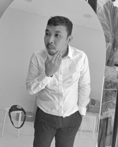 Professional portrait of Bony Fasius Gultom, UI/UX designer specializing in modern and minimalist digital product design.